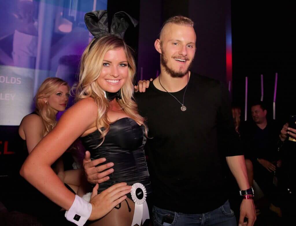Miss February 2007 Carly Lauren (L) and actor Alexander Ludwig attend Playboy and Gramercy Pictures' Self/less party during Comic-Con weekend at Parq Restaurant Nightclub on July 10, 2015 in San Diego, California