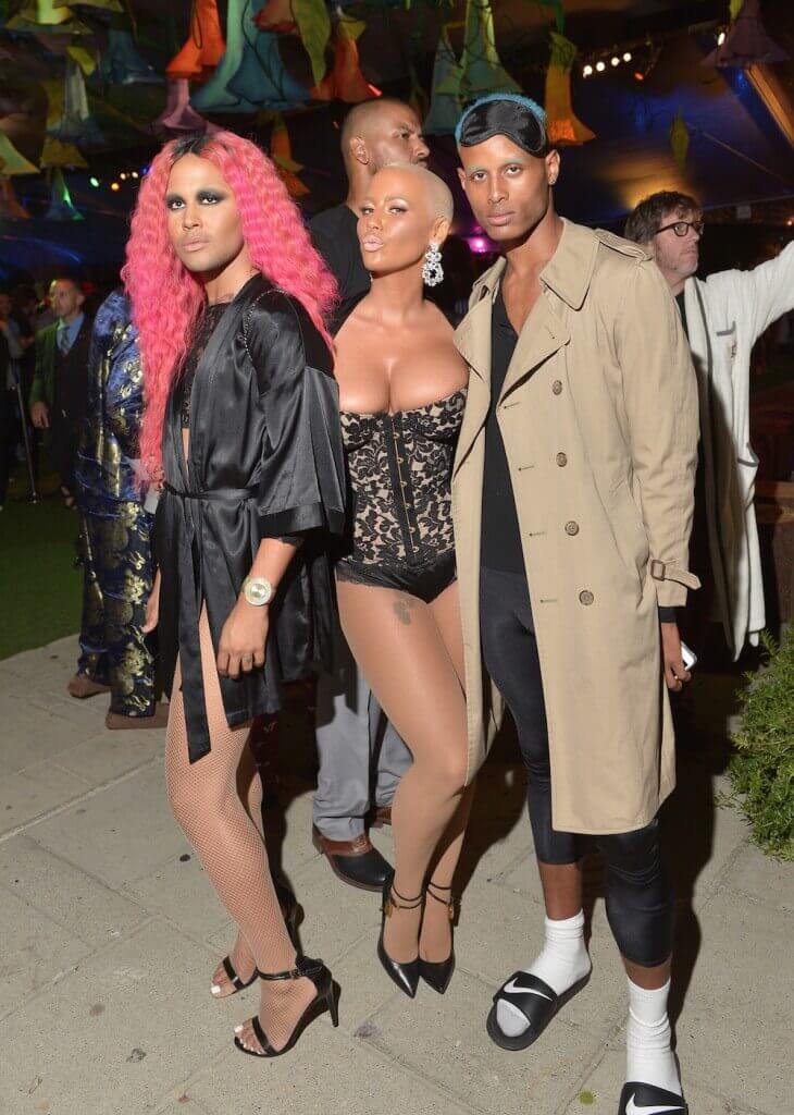 inger Amber Rose (C) with Benji Carlisle (L) and Joseph Isaiah (R) attend the annual Midsummer Night's Dream Party at the Playboy Mansion hosted by Hugh Hefner on August 1, 2015 in Los Angeles, California