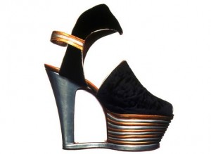 Salvatore Ferragamo's 1939 cork platform shoe with wood flat-through sole.