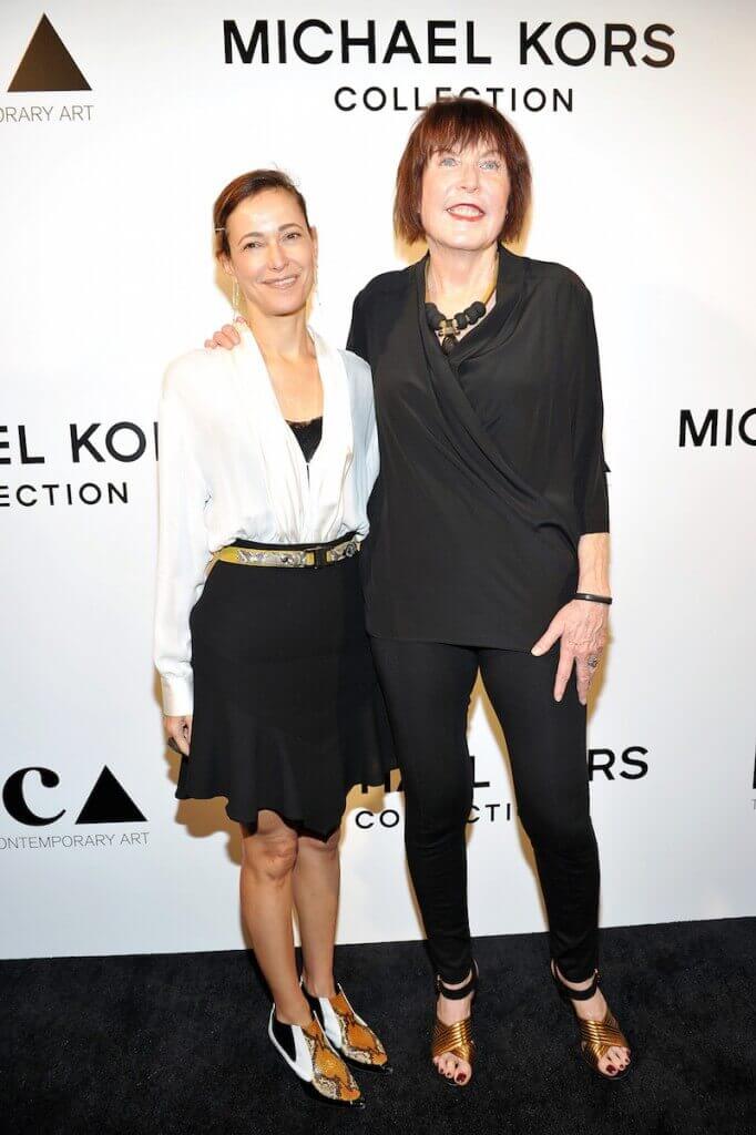 Jeanne Greenberg-Rohatyn (L) and artist Marilyn Minter attend Michael Kors Presents The Museum Of Contemporary Art's Distinguished  Women In The Arts Luncheon at the Beverly Wilshire Four Seasons Hotel on October 28, 2015 in Beverly Hills, California