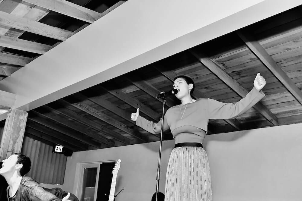 Miya Folick performs at Conde Nast & The Women March's Cocktail Party to Celebrate the One Year Anniversary of the March & the Publication of Together We Rise on January 24, 2018 in West Hollywood, California