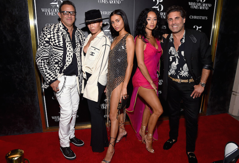 (L-R) What Goes Around Comes Around Co-Founder Seth Weisser, guest, Kristin Nicole Crawley, Draya Michele, and What Goes Around Comes Around Co-Founder Gerard Maione attend Christie's x What Goes Around Comes Around 25th Anniversary Auction Preview at What Goes Around Comes Around on August 21, 2018 in Beverly Hills, California