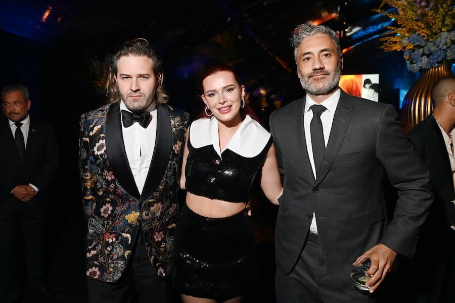 Bella Thorne (C) and Taika Waititi (R) attend the amfAR Gala Los Angeles 2021 honoring TikTok and Jeremy Scott at Pacific Design Center on November 04, 2021 in West Hollywood, California