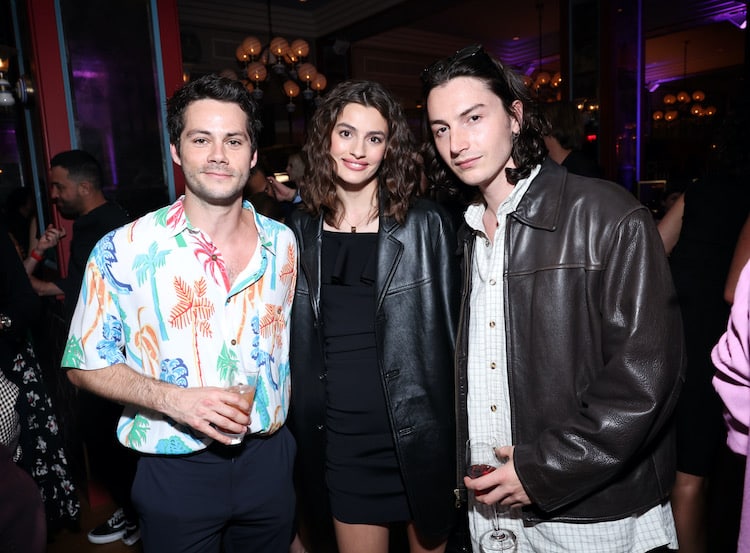 (L-R) Dylan O'Brien, Diana Silvers, and guest attend Vanity Fair and Lancôme Celebrate The Future Of Hollywood, at Mother Wolf, on March 24, 2022 in Los Angeles, California. (