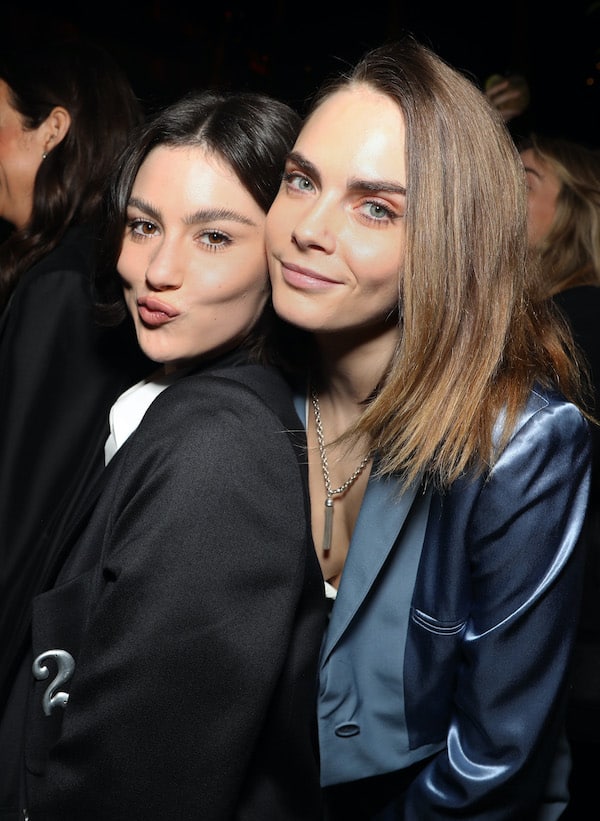 (L-R) Gracie Abrams and Cara Delevgine attend Spotify's 2024 Best New Artist Party at Paramount Studios on February 01, 2024 in Los Angeles, California